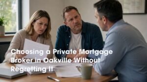 Couple in their forties reviewing private mortgage paperwork with a mortgage broker in Oakville